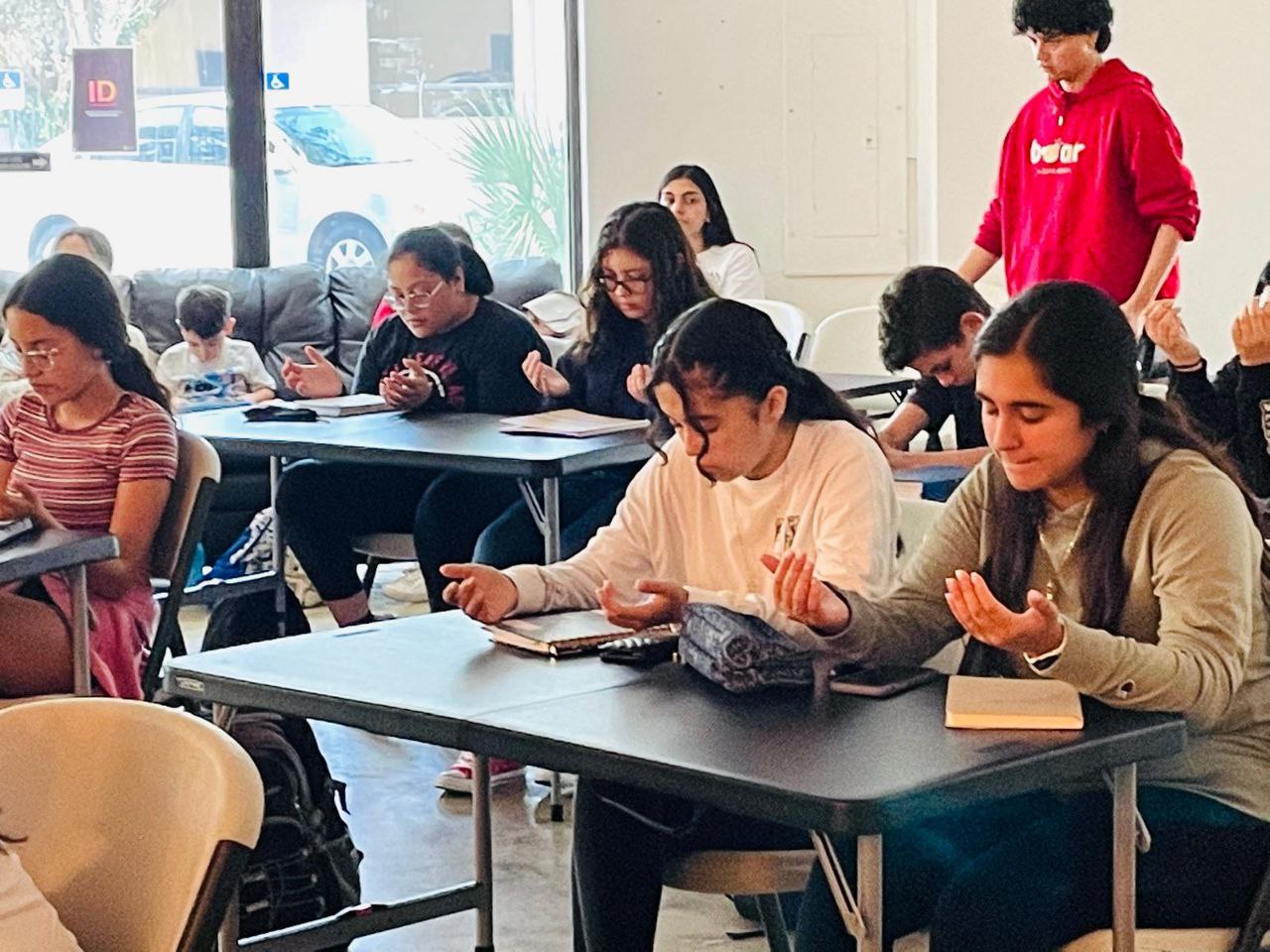 Students praying together